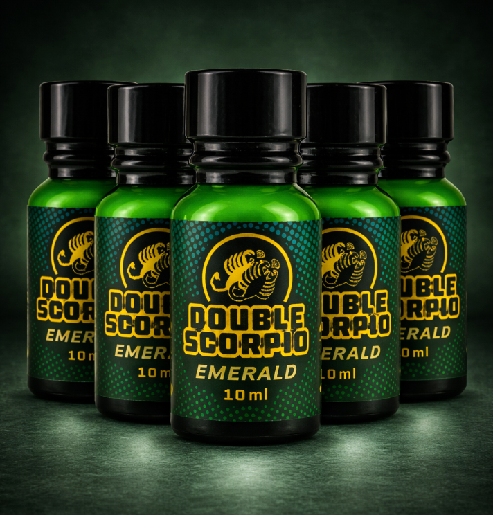 Five bottles of Double Scorpio Emerald poppers on a dark green background.