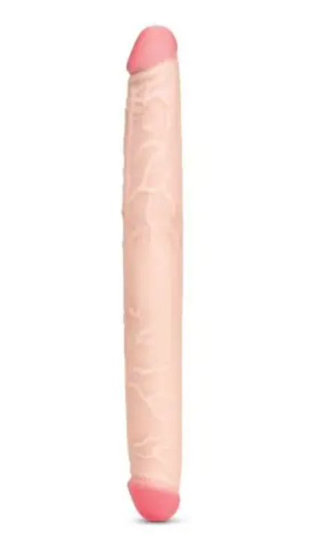Pink double-ended dildo with hyperrealistic vein patterns on a white background
