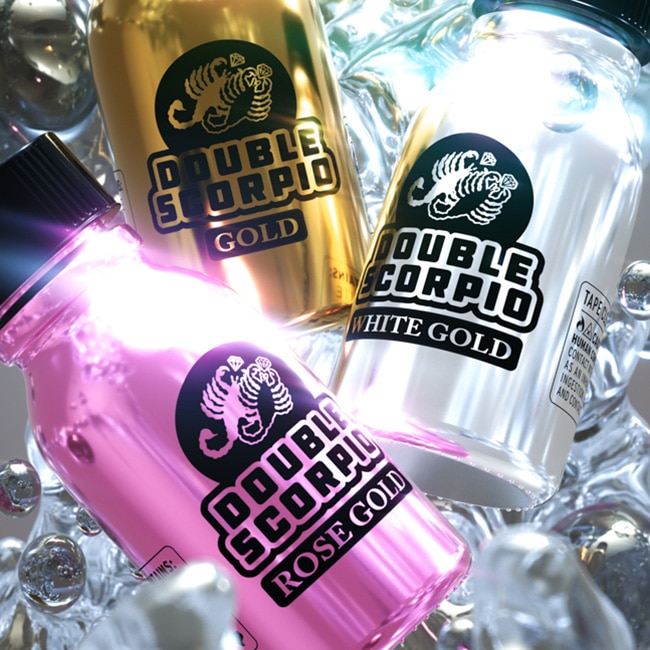 Three bottles of Triple Gold cleaning products—gold, white gold, and rose gold—sparkling among ice crystals.