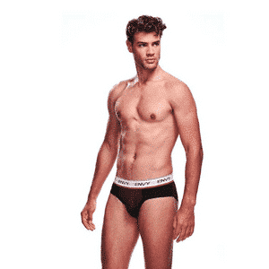 A fit male model posing in black briefs against a white background.